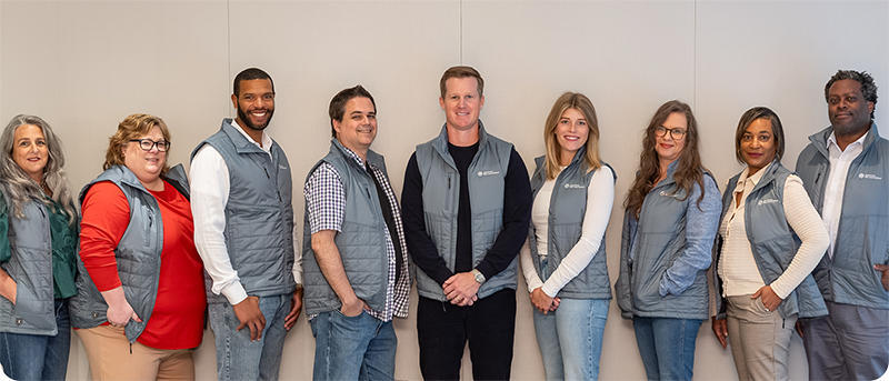 An image showing multiple ABA staff members, all standing in a horizontal line.